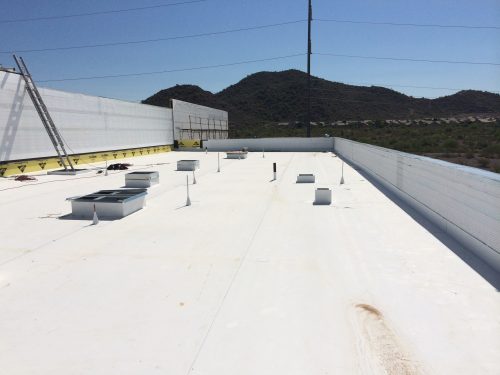 Tapered insulation EPDM roofing system installed in Katy Texas