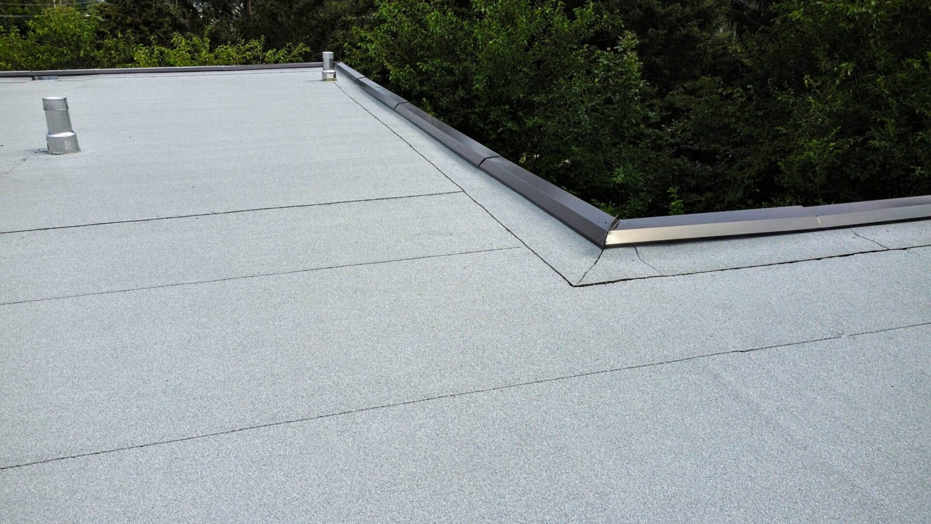 Storm-resistant flat roofing in Katy, TX offering wind and rain protection