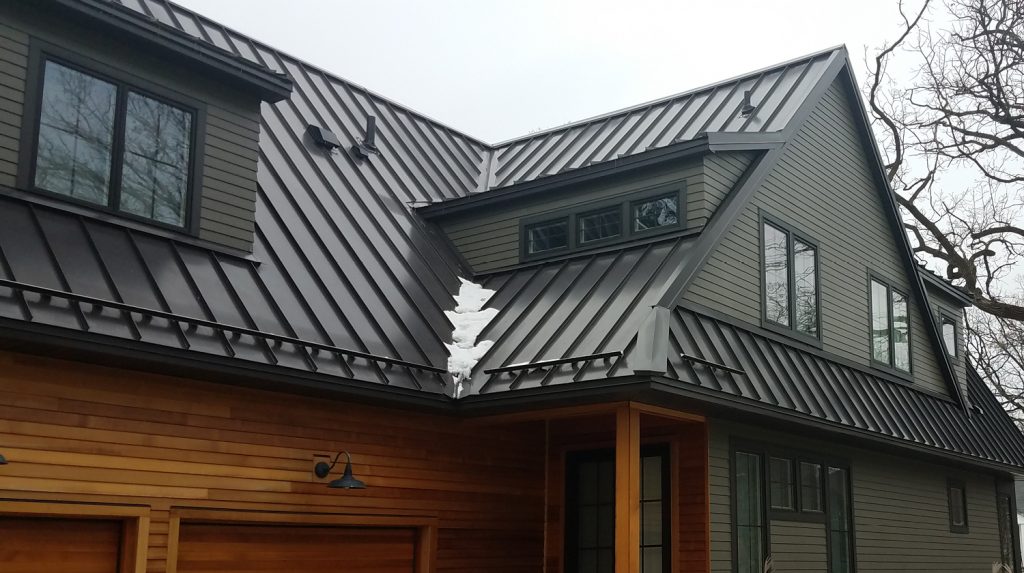 Standing seam metal roof installation in Katy Texas