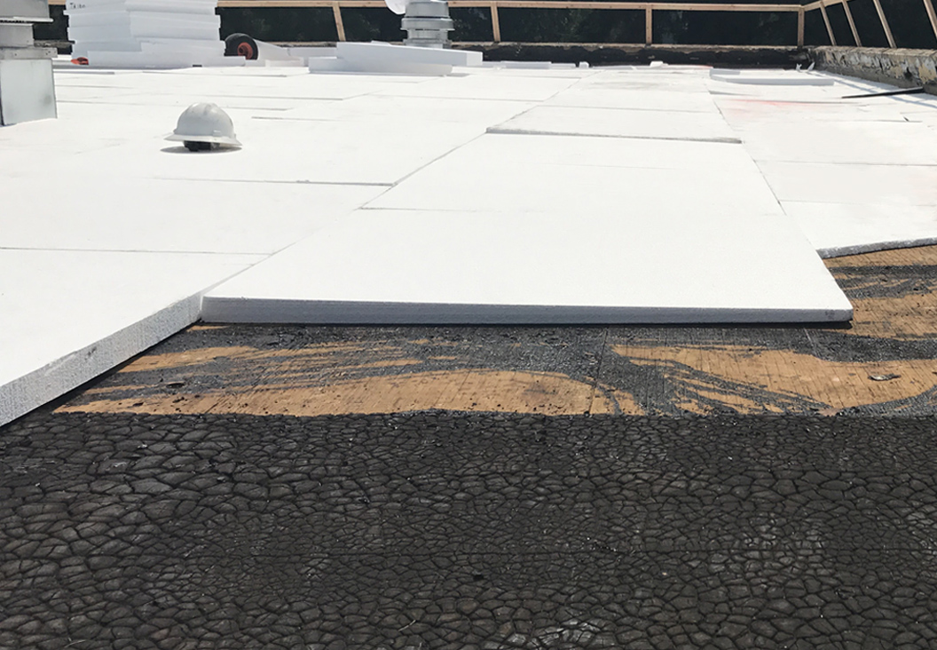 Tapered insulation PVC roofing system in Katy TX flat roof building