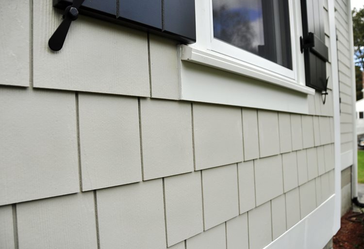 Durable fiber cement siding installed by Driven Roofing in Katy, TX