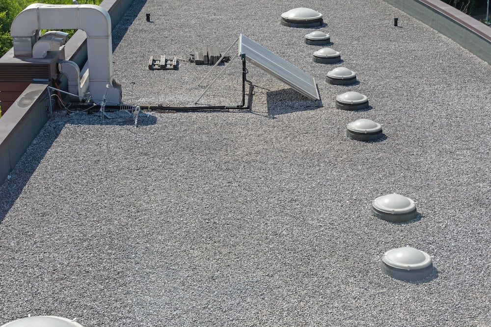 Built-up roofing system on flat commercial roof in Katy TX