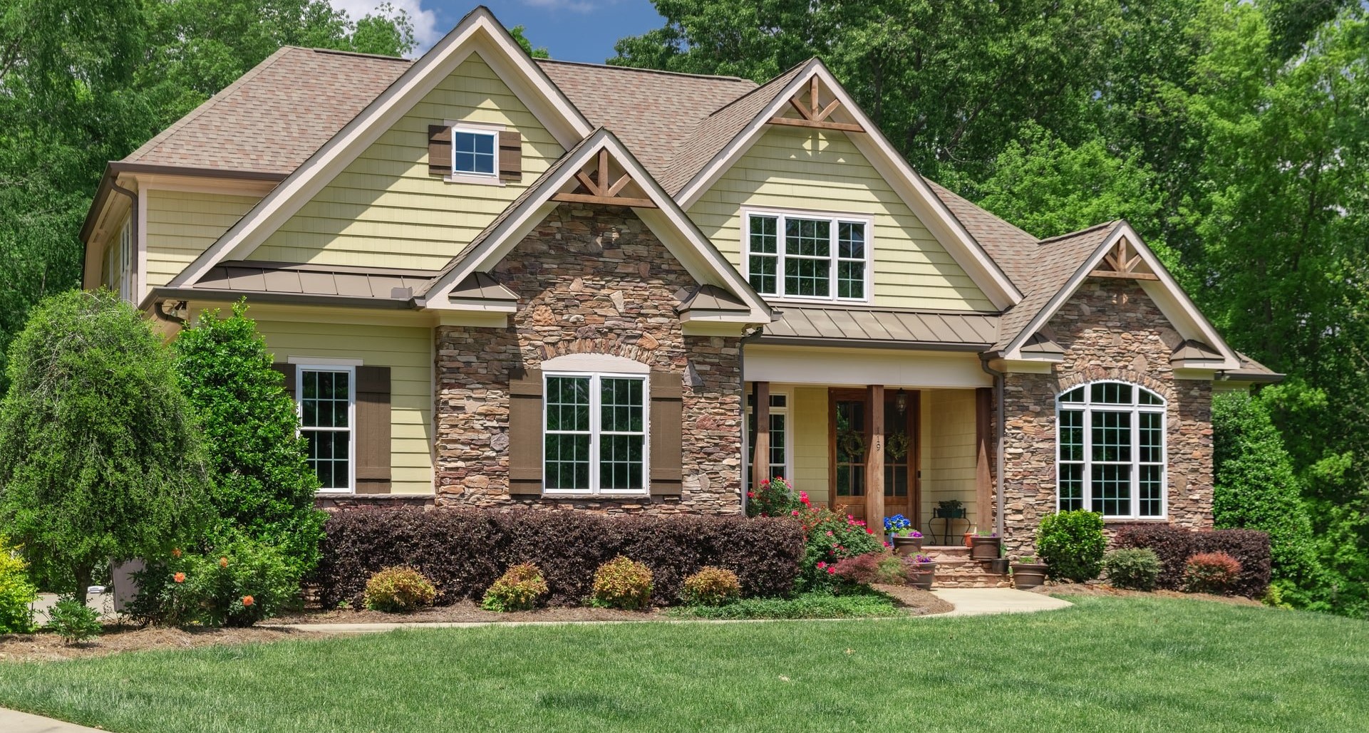 Exterior home remodeling in Katy TX with siding and new entry door installation