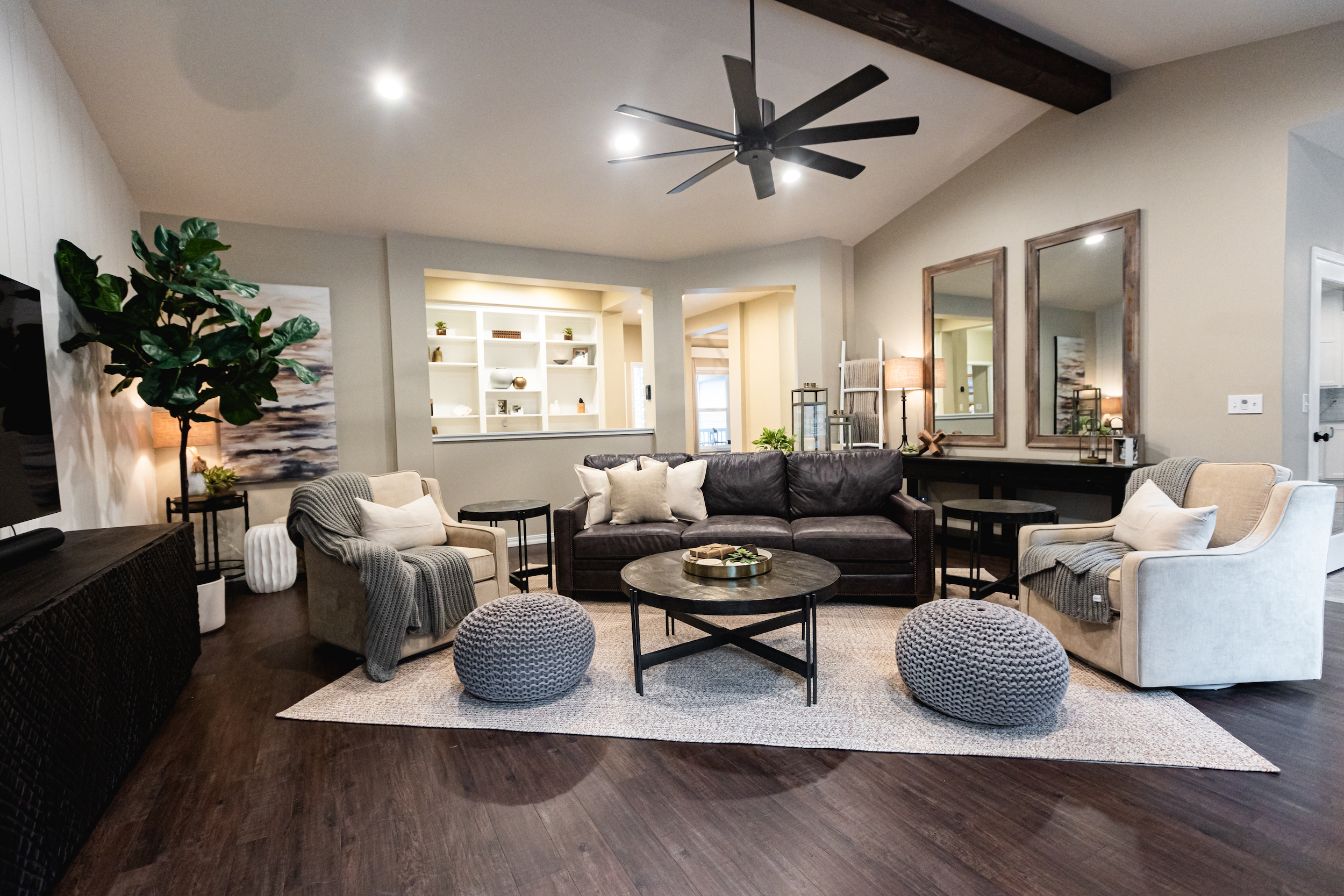 Living room remodel in Katy TX with new floors, recessed lighting, and fresh paint