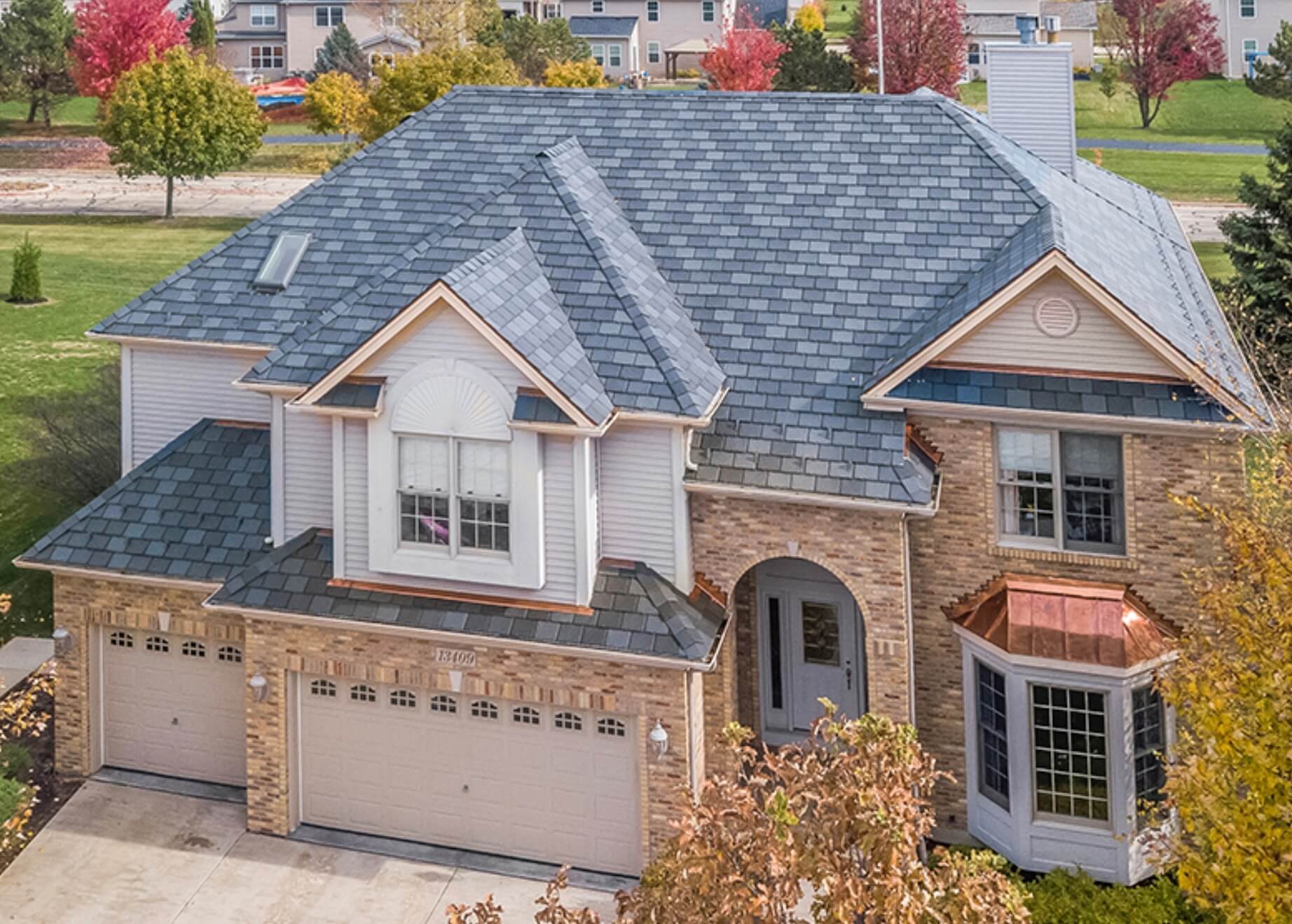 Slate roofing replacement for luxury home in Katy Texas
