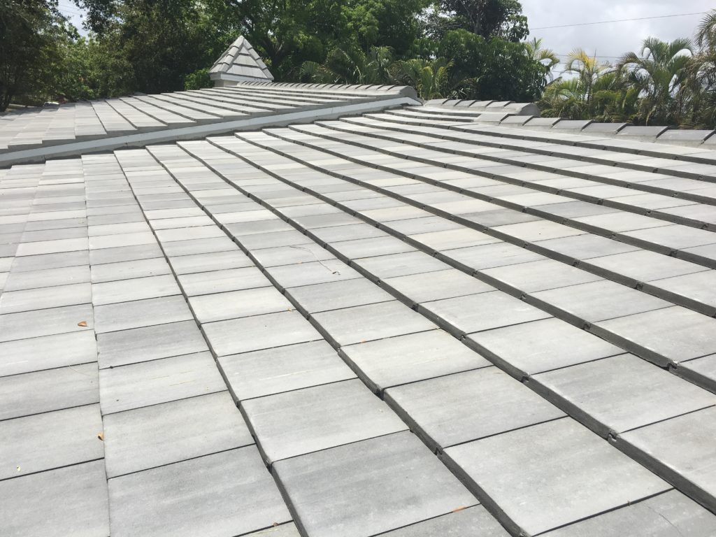 Modern flat tile roofing system on a commercial building in Katy Texas

