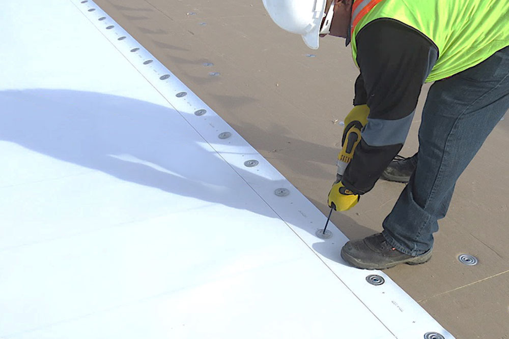 Mechanically Attached TPO Roof installation in Katy TX